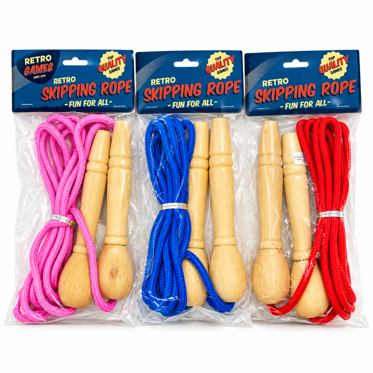 Three packaged retro skipping ropes on a white background, each in clear plastic with a blue header card. The sets include pink, blue, and red ropes with light wood handles.