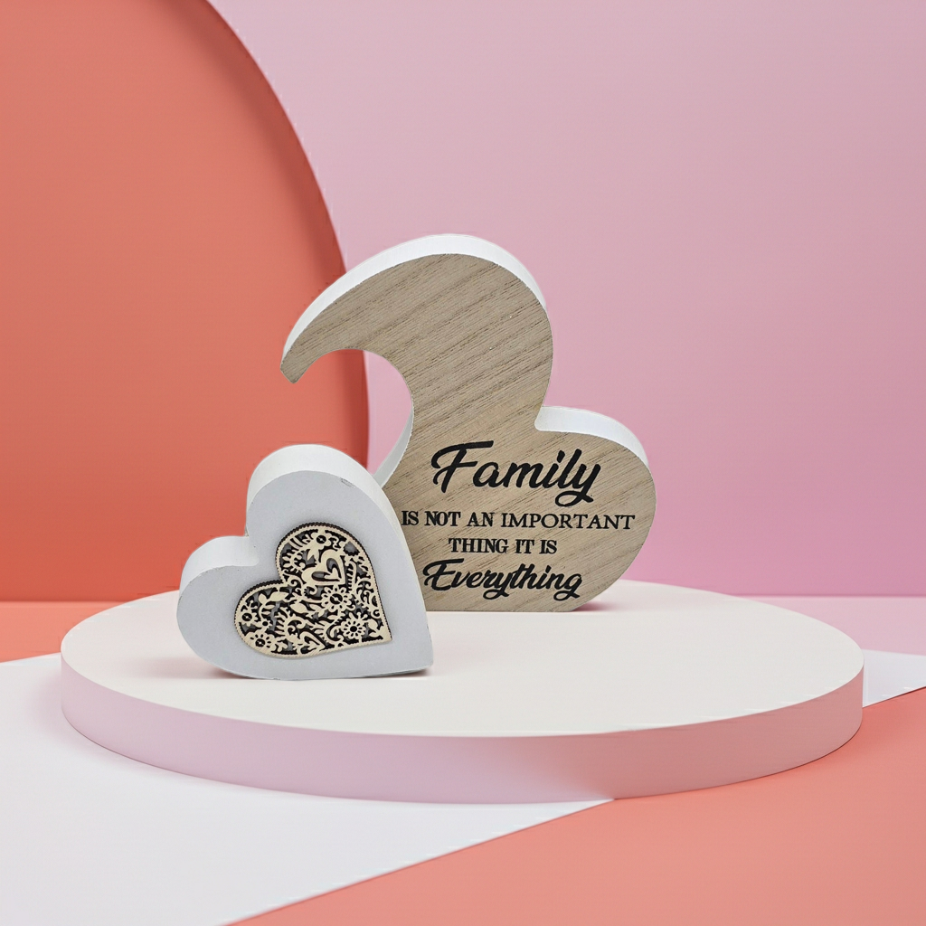 Decorative wooden hearts with engraved text on a colorful background