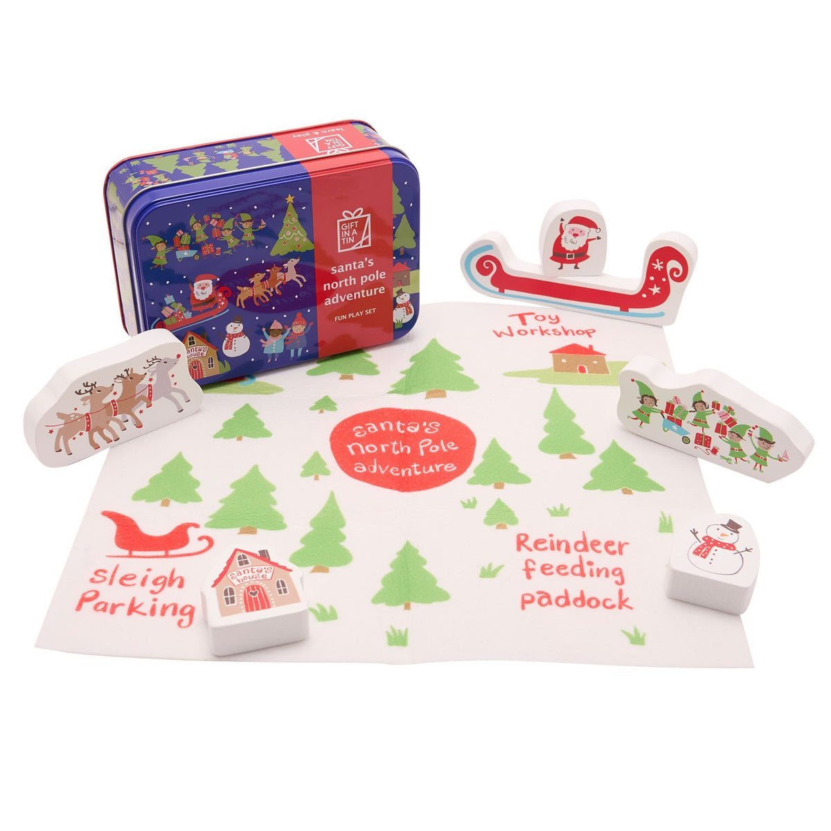 Christmas-themed toy set with a tin, mat, and small toys on a white background