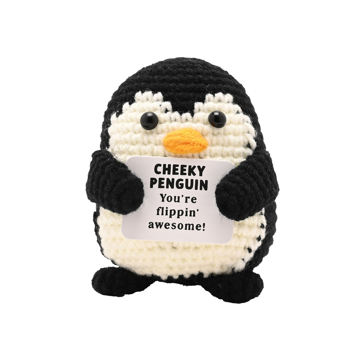 A crocheted penguin toy holding a white sign that reads 'CHEEKY PENGUIN You're flippin' awesome!' on a plain white background.