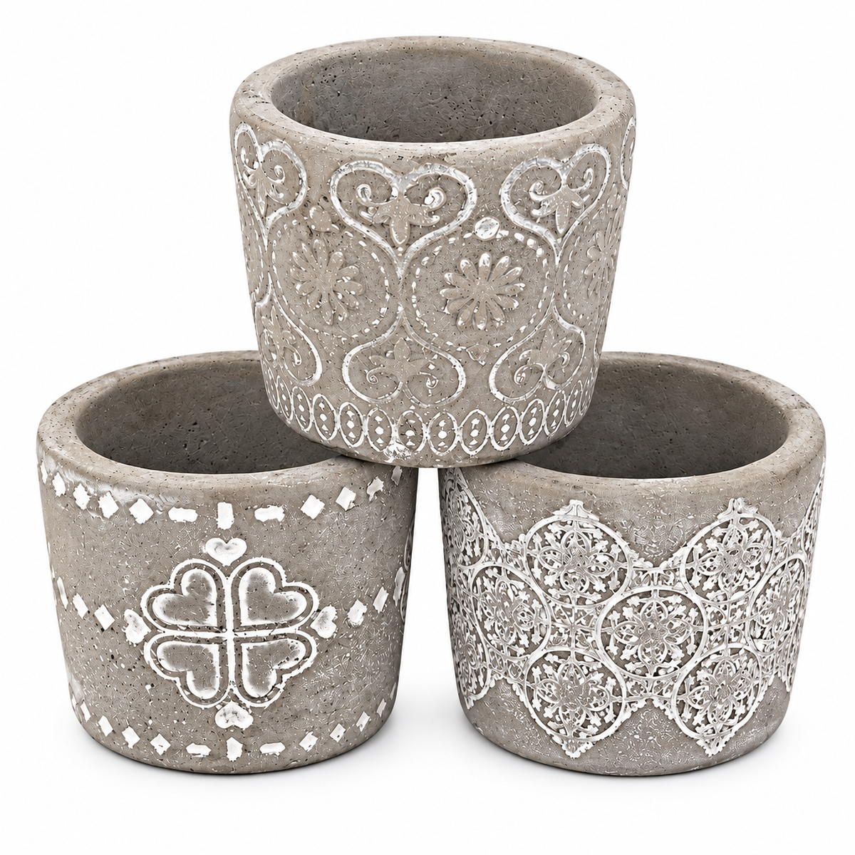 Three small concrete planters with white decorative patterns, arranged in a pyramid stack on a white background.