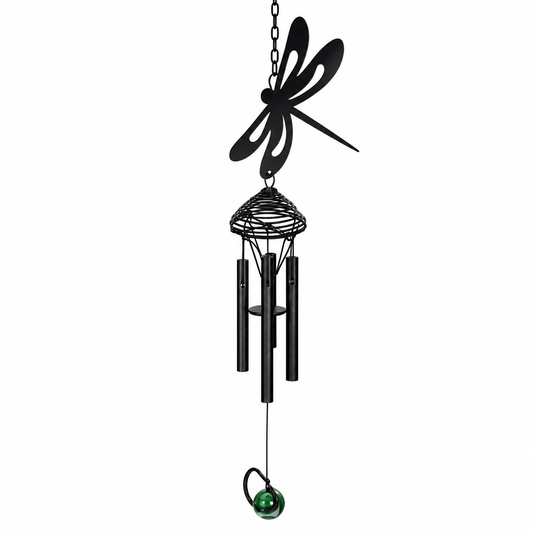 A black metal dragonfly wind chime hanging outdoors, with a green glass bead at the bottom, shown against a white background.