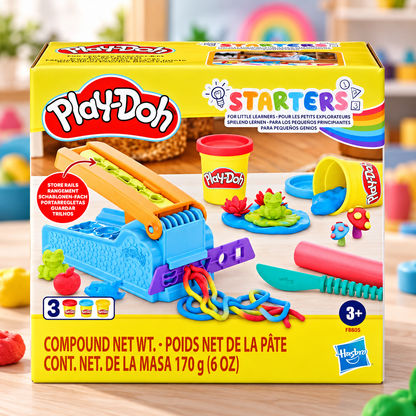 Play-Doh Starters Compound modeling clay set in its original yellow retail box, featuring a blue compound machine, clay tools, and colorful clay pieces pictured on the front.