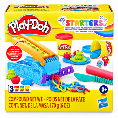 Play-Doh Starters Compound modelling clay set in its original yellow retail box, featuring a blue compound machine, clay tools, and colourful clay pieces pictured on the front. on a. white background