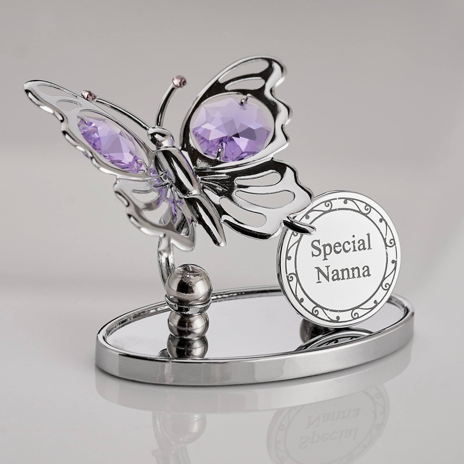 Bohemia Butterfly-shaped die cast decorative item with purple gemstones and 'Special Nanna' plaque on a gray background