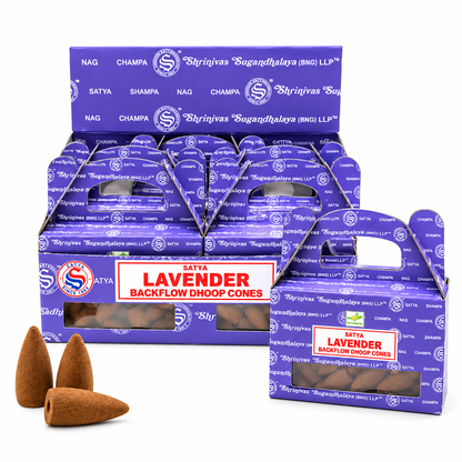 Lavender backflow Dhoop cones in branded purple packaging, with several brown cone shapes displayed in front on a white background.