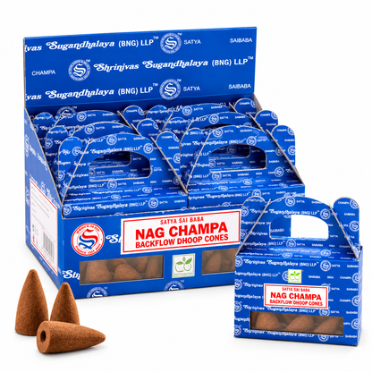 A retail display box and smaller individual box of Satya Sai Baba Nag Champa Backflow Dhoop Cones, with three loose brown conical incense cones in front, on a white background.