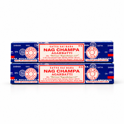 Two blue and red boxes of Satya Sai Baba Nag Champa Agarbatti (candle wicks) stacked horizontally on a white background.