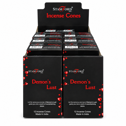 A black cardboard display box filled with small black boxes of Stamford Incense Cones. The front boxes are labeled 'Demon's Lust' in red text with small red heart graphics, and the display header reads 'Stamford Incense Cones'.