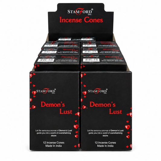 A black cardboard display box filled with small black boxes of Stamford Incense Cones. The front boxes are labeled 'Demon's Lust' in red text with small red heart graphics, and the display header reads 'Stamford Incense Cones'.