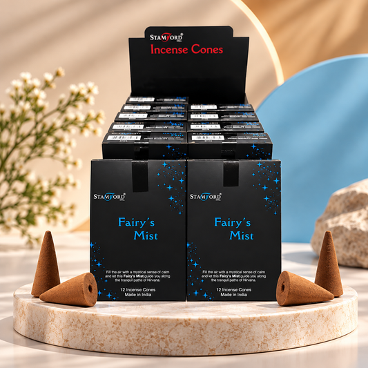 A display box of Stamford Fairy's Mist incense cones, showing two front-facing black boxes with blue starry graphics and a back panel labeled 'Stamford Incense Cones'.