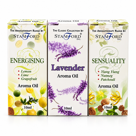 Three 10ml boxes of Stamford Inc. Aroma Oil in a row: Energising (yellow, green, white), Lavender (white with purple flowers), and Sensuality (white with yellow, green, brown, and pink illustrations).
