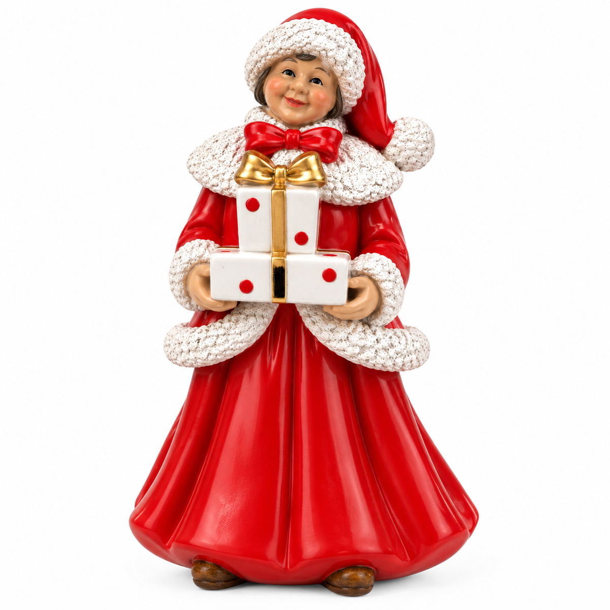 A vintage-style Christmas figurine of a smiling woman in a red dress and Santa hat, holding a white gift box with red dots and a gold bow, set against a plain white background.