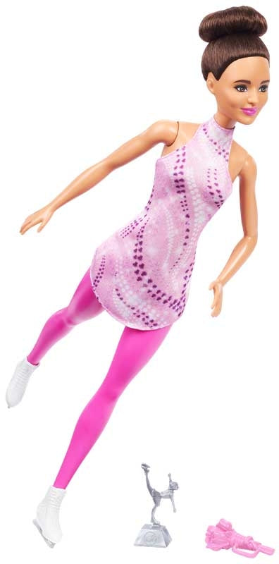 Barbie doll in a pink dress and leggings with a white background