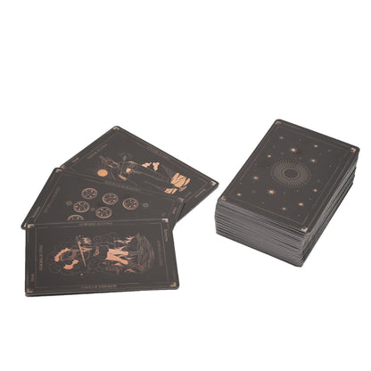 Set of tarot cards with black and gold design on a white background