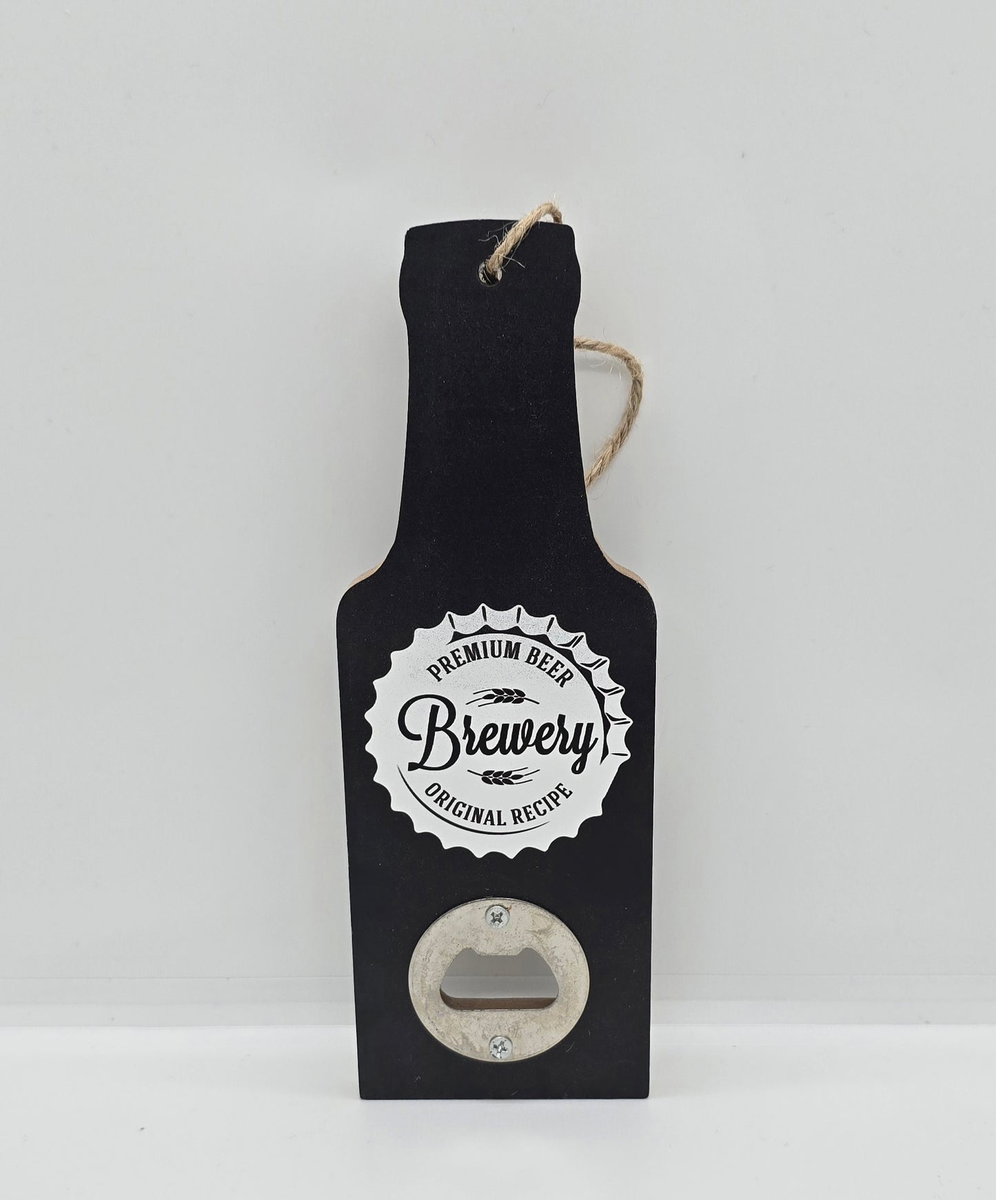 Two wooden hanging beer bottle-shaped bottle openers in black with a bottle cap design with words "Premium beer, Brewery, Original recipe" on a white background