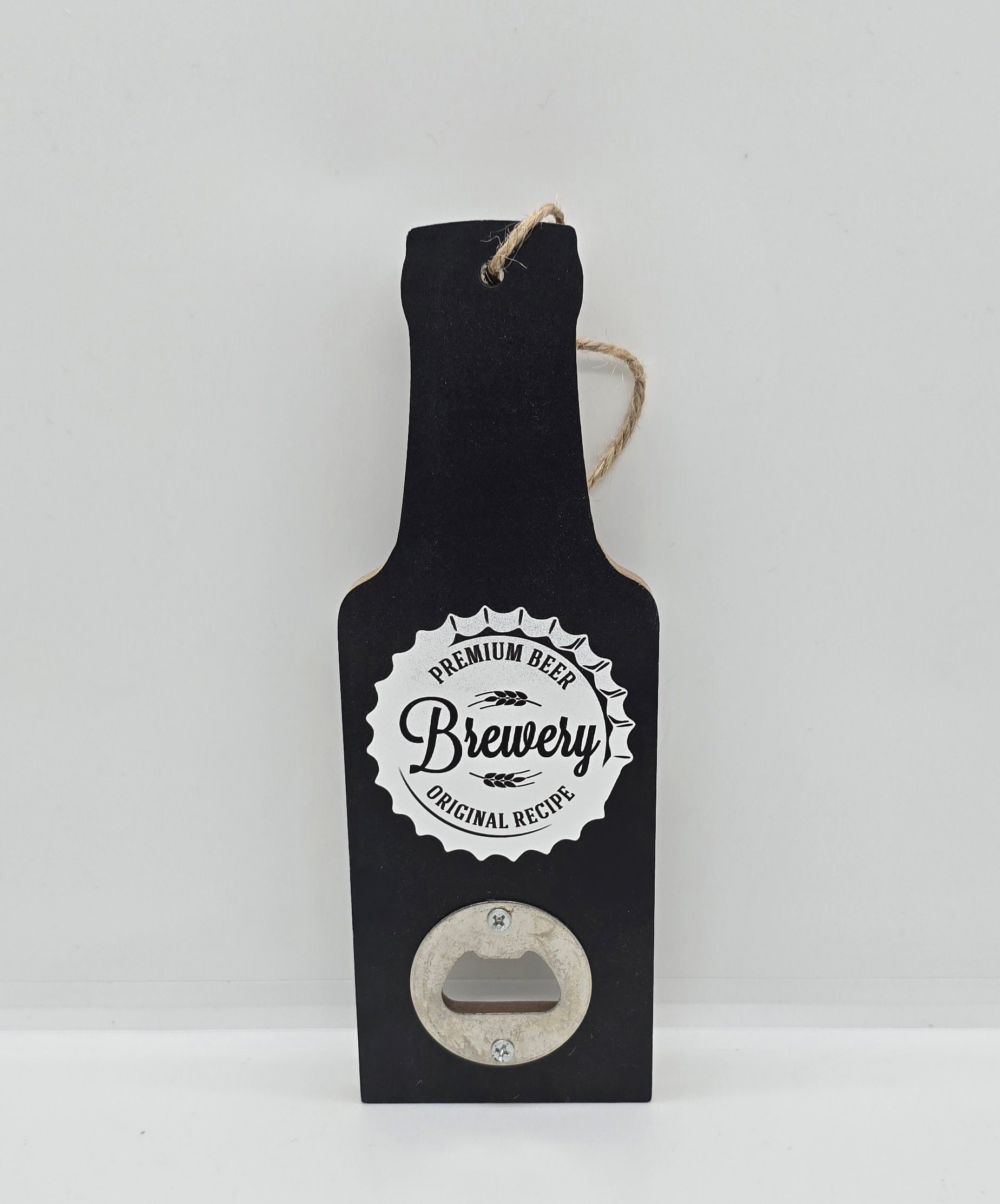 Two wooden hanging beer bottle-shaped bottle openers in black with a bottle cap design with words "Premium beer, Brewery, Original recipe" on a white background