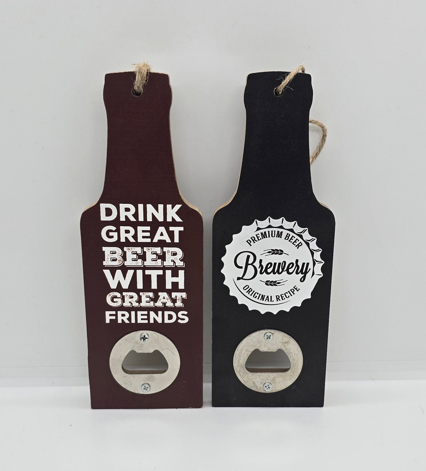 Two wooden hanging beer bottle-shaped bottle openers in a brown colour  with text "Drink great beer with great friends" or black with a bottle cap design with words "Premium beer, Brewery, Original recipe" on a white background